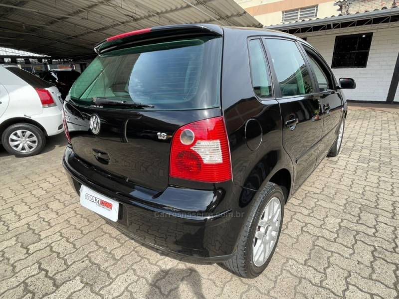 VOLKSWAGEN - POLO - 2006/2006 - Preta - R$ 27.900,00
